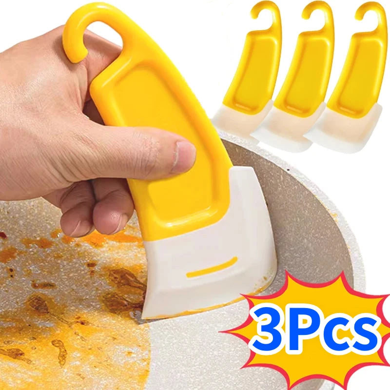 Espátula de silicona para limpieza de utensilios de cocina.