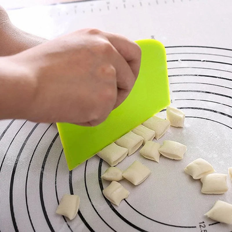 Espátula y raspador para repostería.