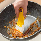Espátula de silicona para limpieza de utensilios de cocina.